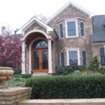 stone veneer house with columns