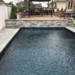 bluestone with rockface pool and patio